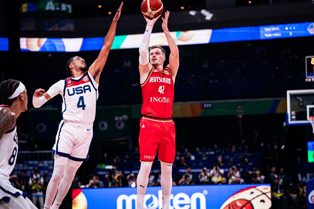 Andreas Obst shots a three- https://www.fiba.basketball/basketballworldcup/2023/game/0809/USA-Germany/#iset=fb9a1fda-40c3-43eb-bf50-3fd1746da7fc&iid=dcd056f1-1f5f-4221-b57e-7c869d8dcd98 #Matteo Marchi